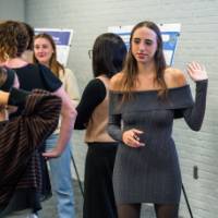 Individual talking to another student